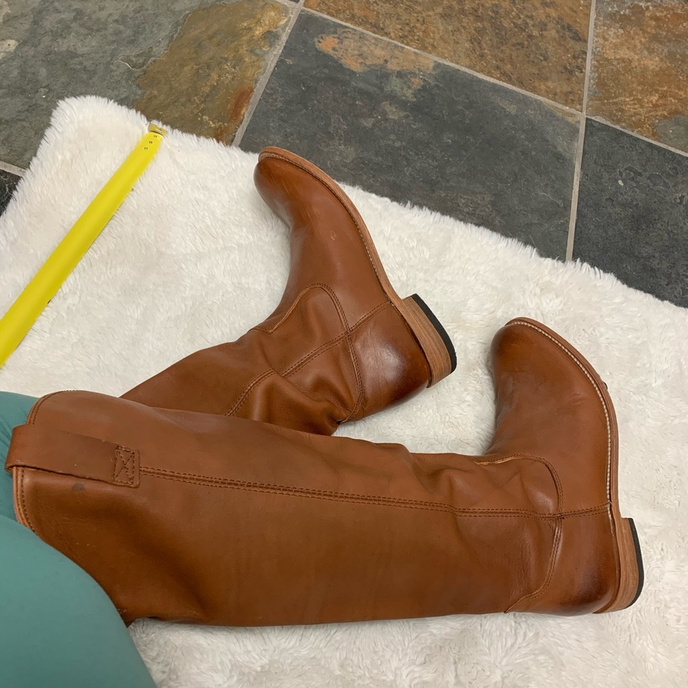 Tall brown leather boutique boots